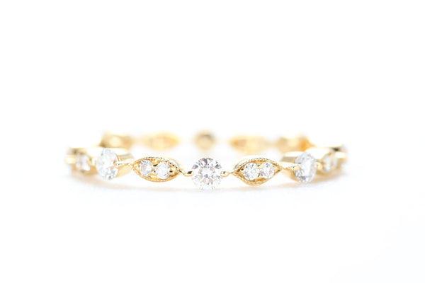 Round and Marquise Shaped Diamond Ring Yellow Gold