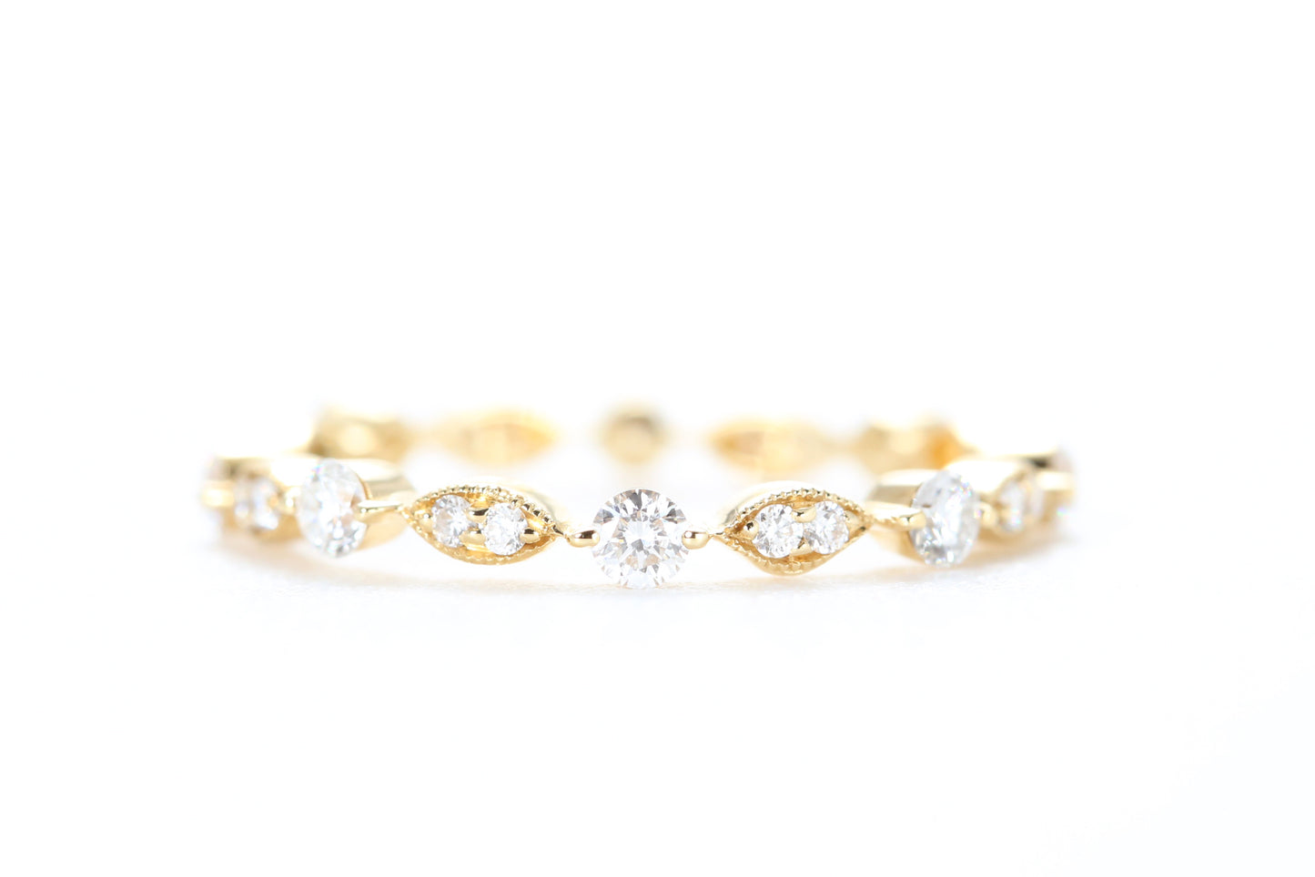 Round and Marquise Shaped Diamond Ring Yellow Gold
