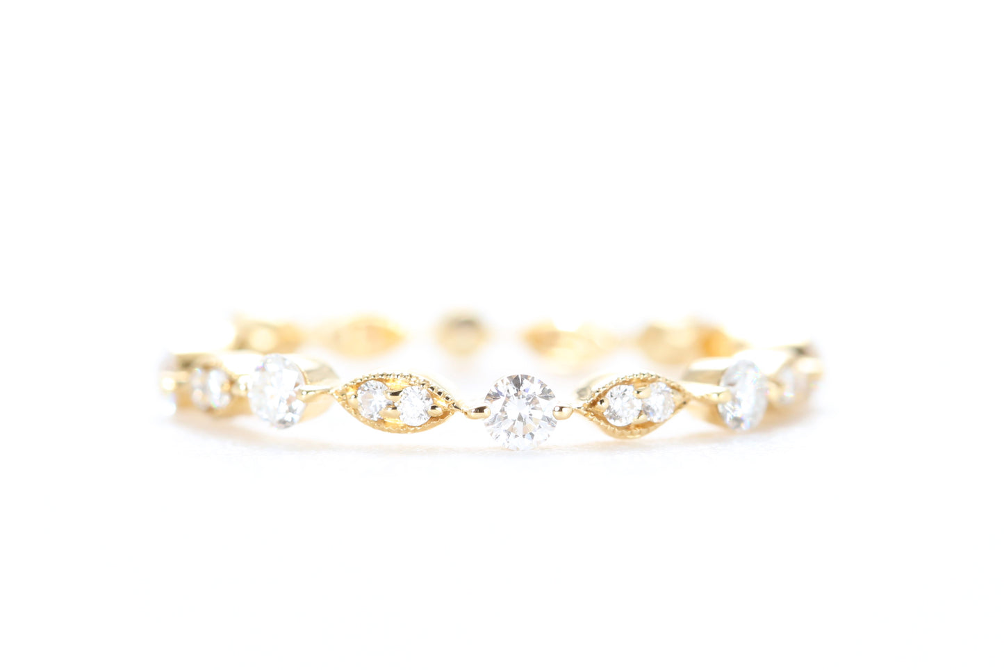 Round and Marquise Shaped Diamond Ring Yellow Gold
