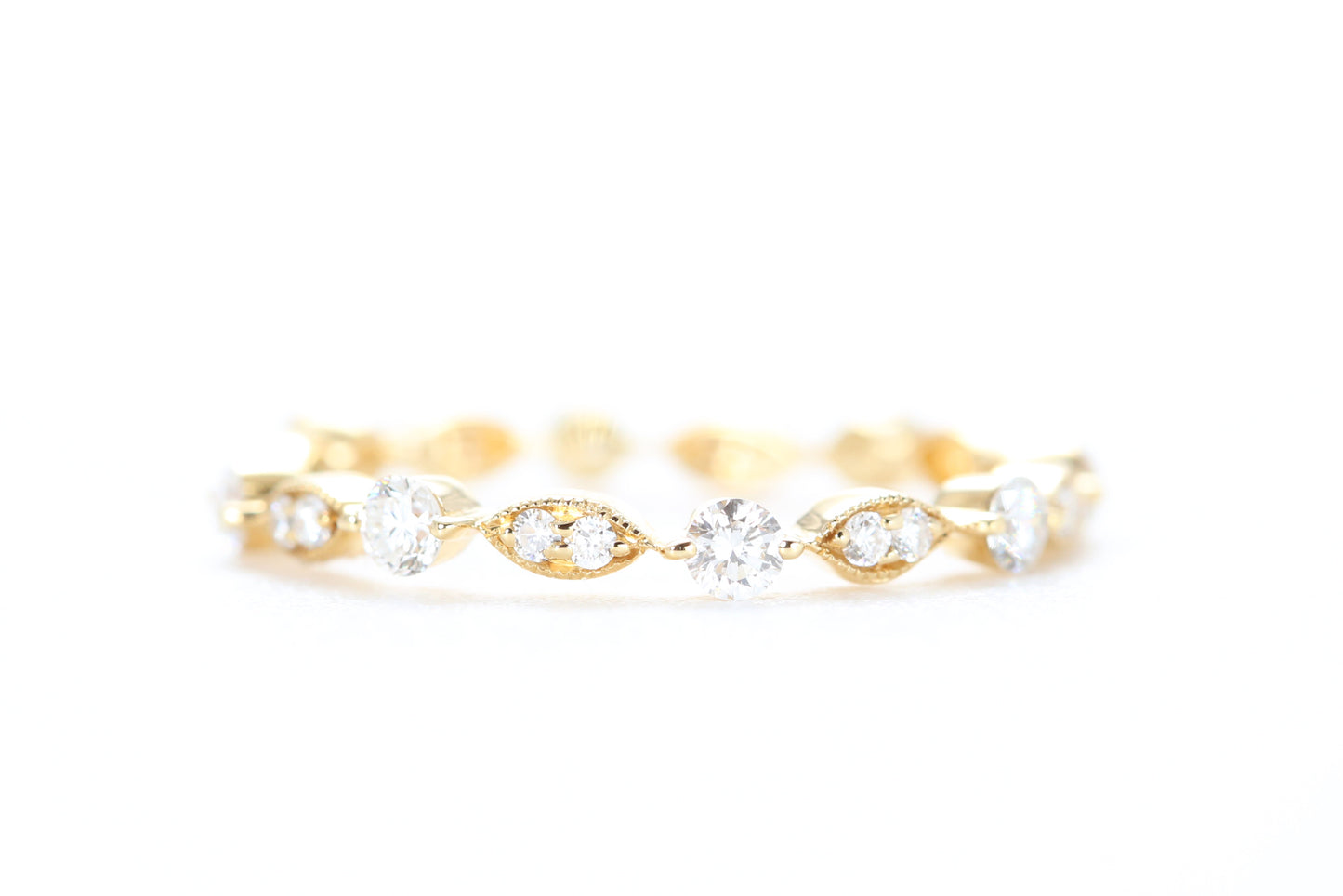 Round and Marquise Shaped Diamond Ring Yellow Gold
