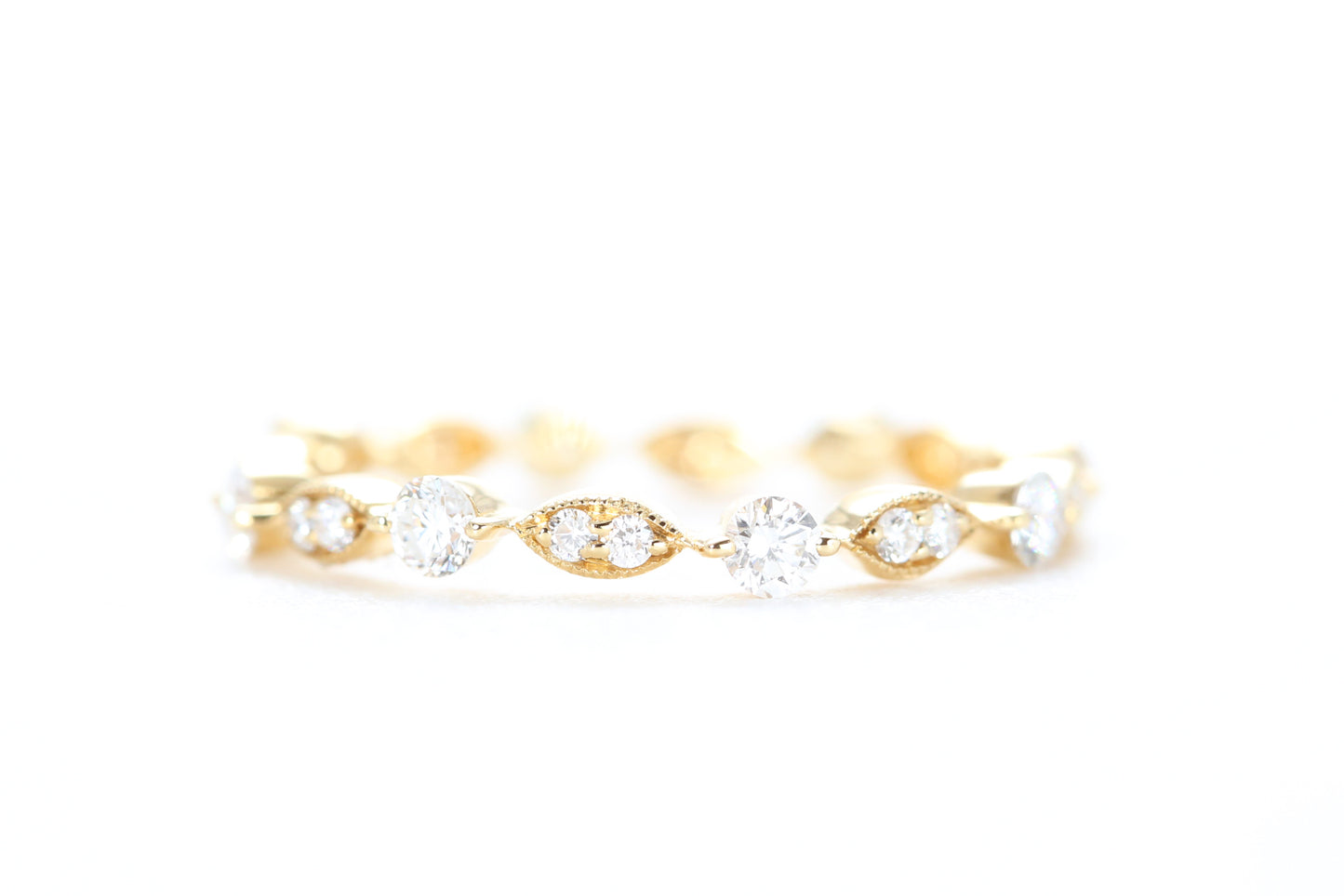 Round and Marquise Shaped Diamond Ring Yellow Gold