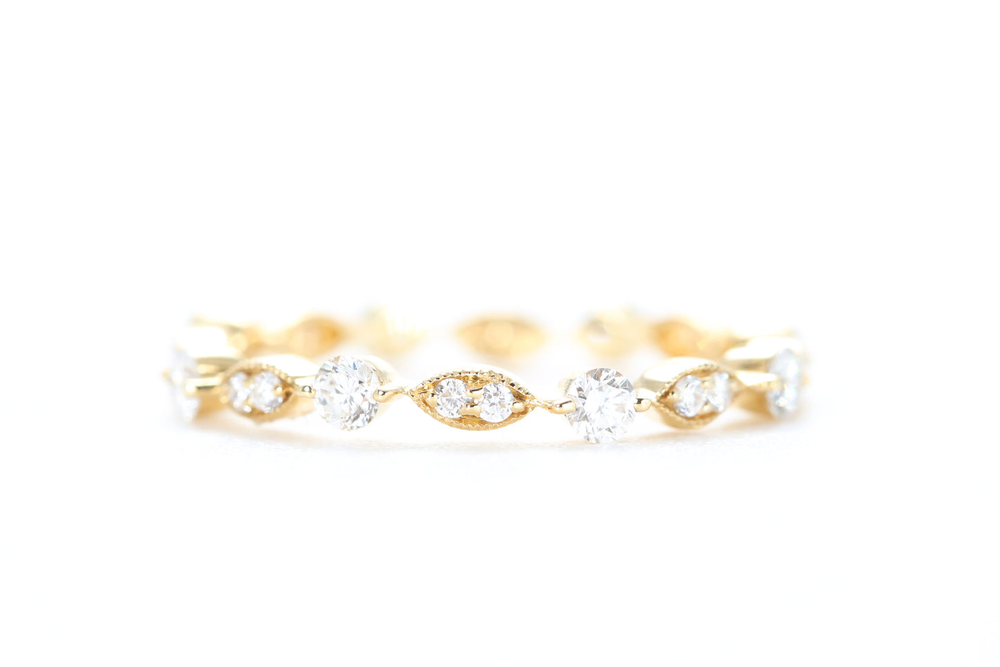 Round and Marquise Shaped Diamond Ring Yellow Gold