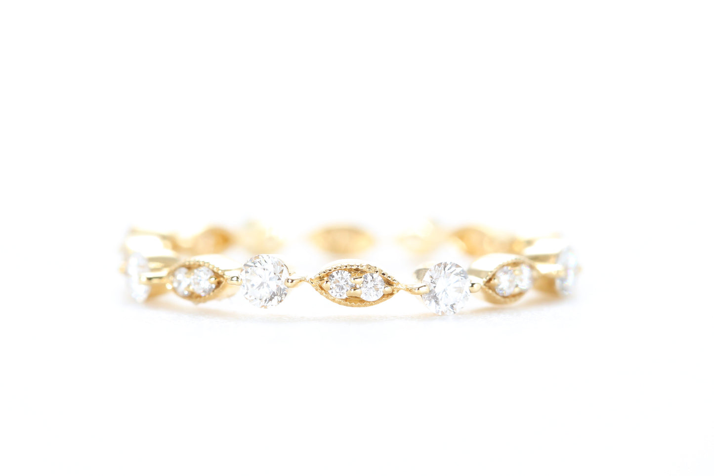 Round and Marquise Shaped Diamond Ring Yellow Gold