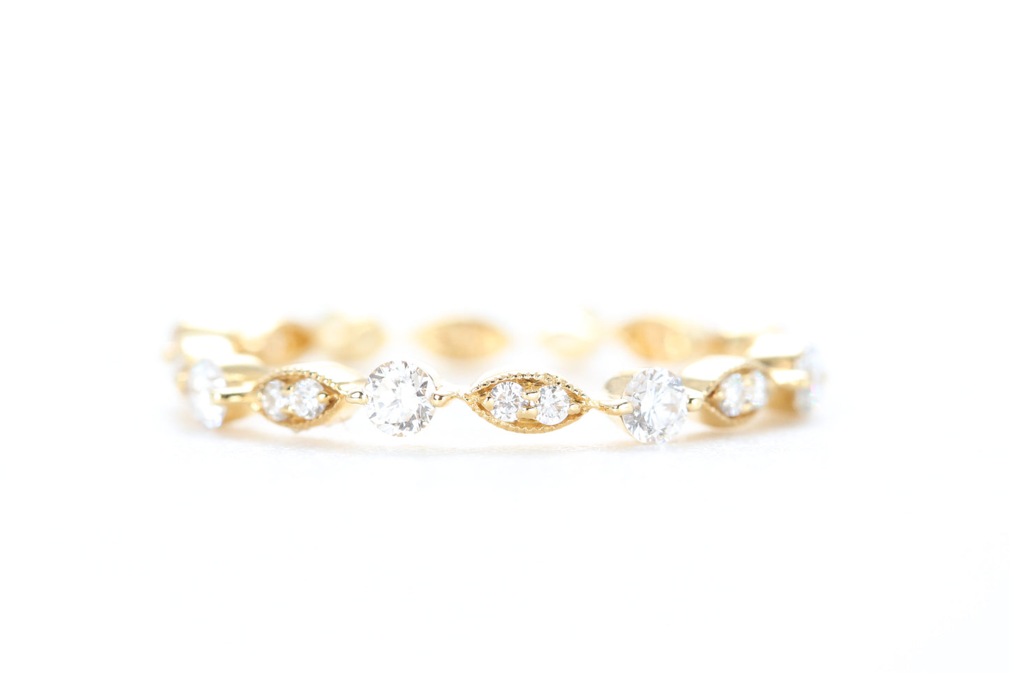 Round and Marquise Shaped Diamond Ring Yellow Gold
