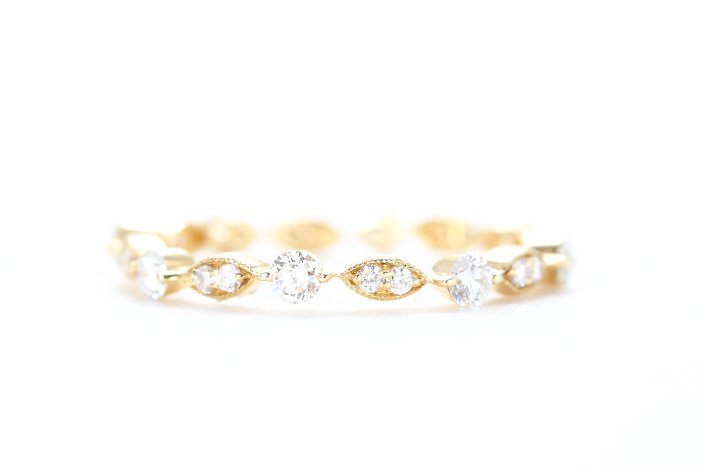 Round and Marquise Shaped Diamond Ring Yellow Gold