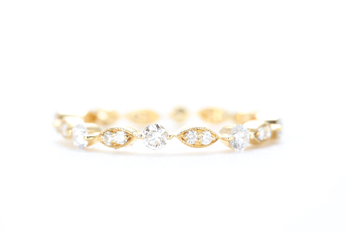Round and Marquise Shaped Diamond Ring Yellow Gold