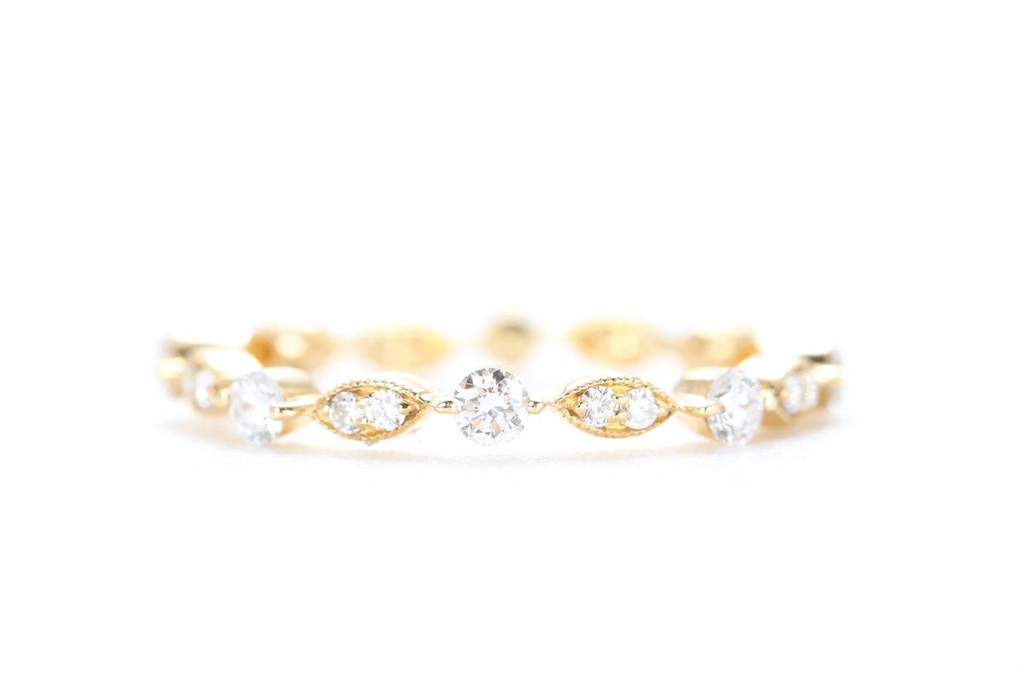Round and Marquise Shaped Diamond Ring Yellow Gold