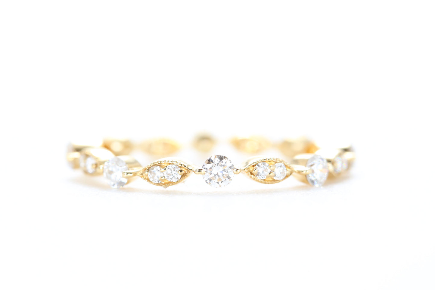 Round and Marquise Shaped Diamond Ring Yellow Gold