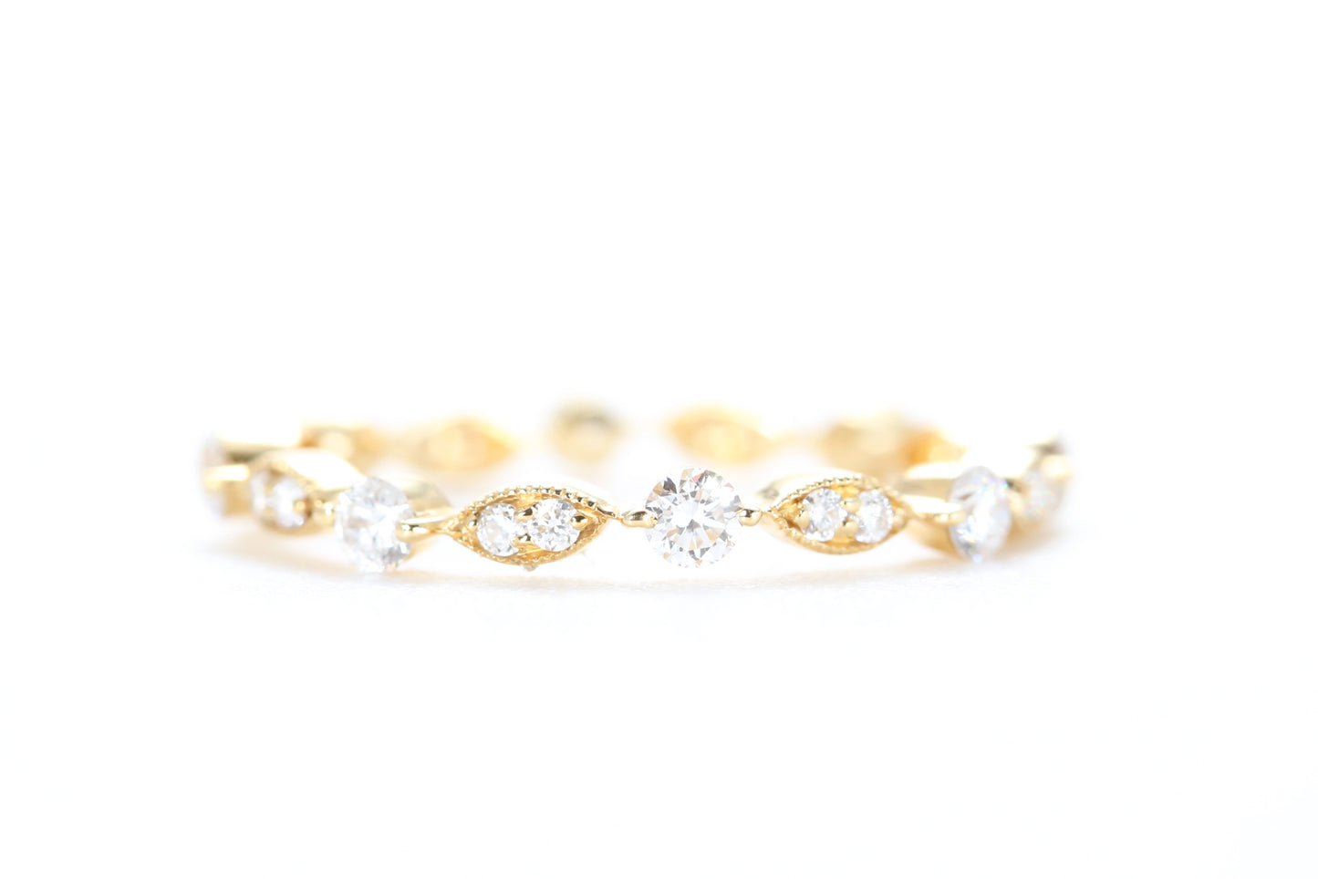 Round and Marquise Shaped Diamond Ring Yellow Gold