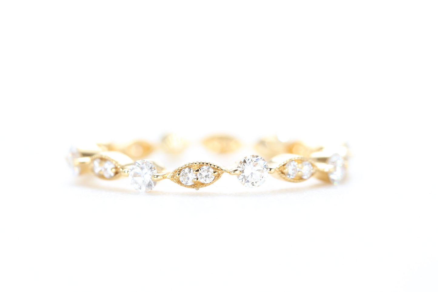 Round and Marquise Shaped Diamond Ring Yellow Gold