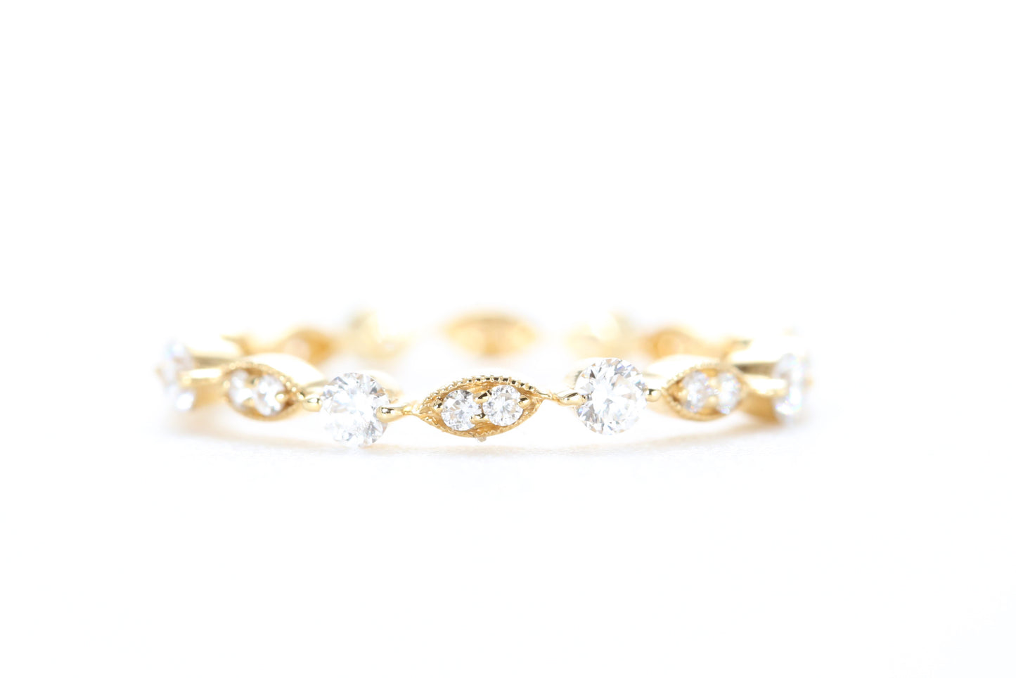 Round and Marquise Shaped Diamond Ring Yellow Gold