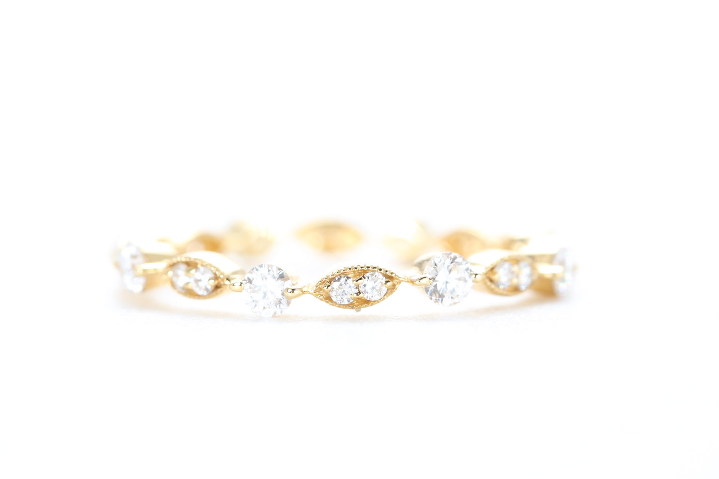 Round and Marquise Shaped Diamond Ring Yellow Gold