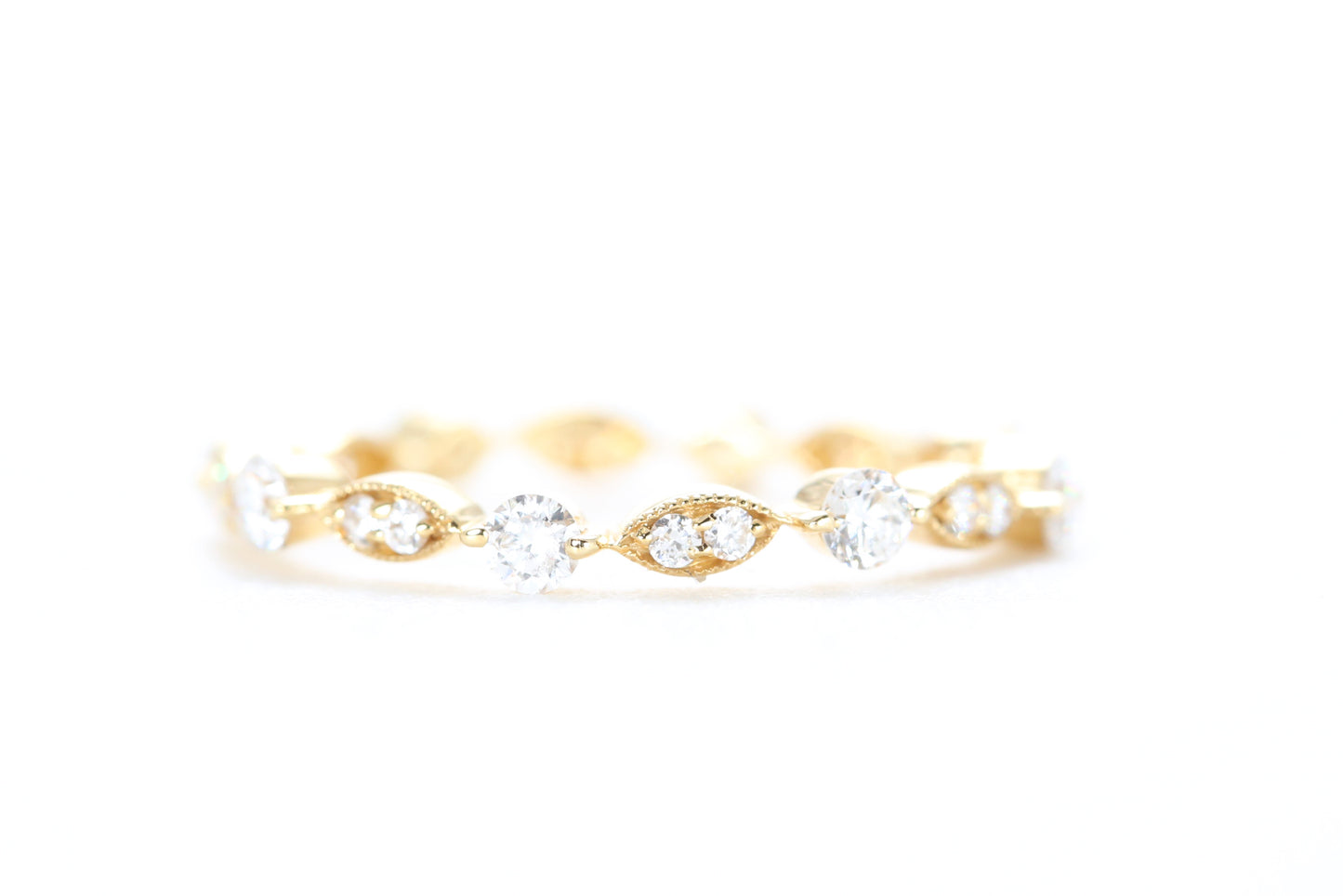 Round and Marquise Shaped Diamond Ring Yellow Gold
