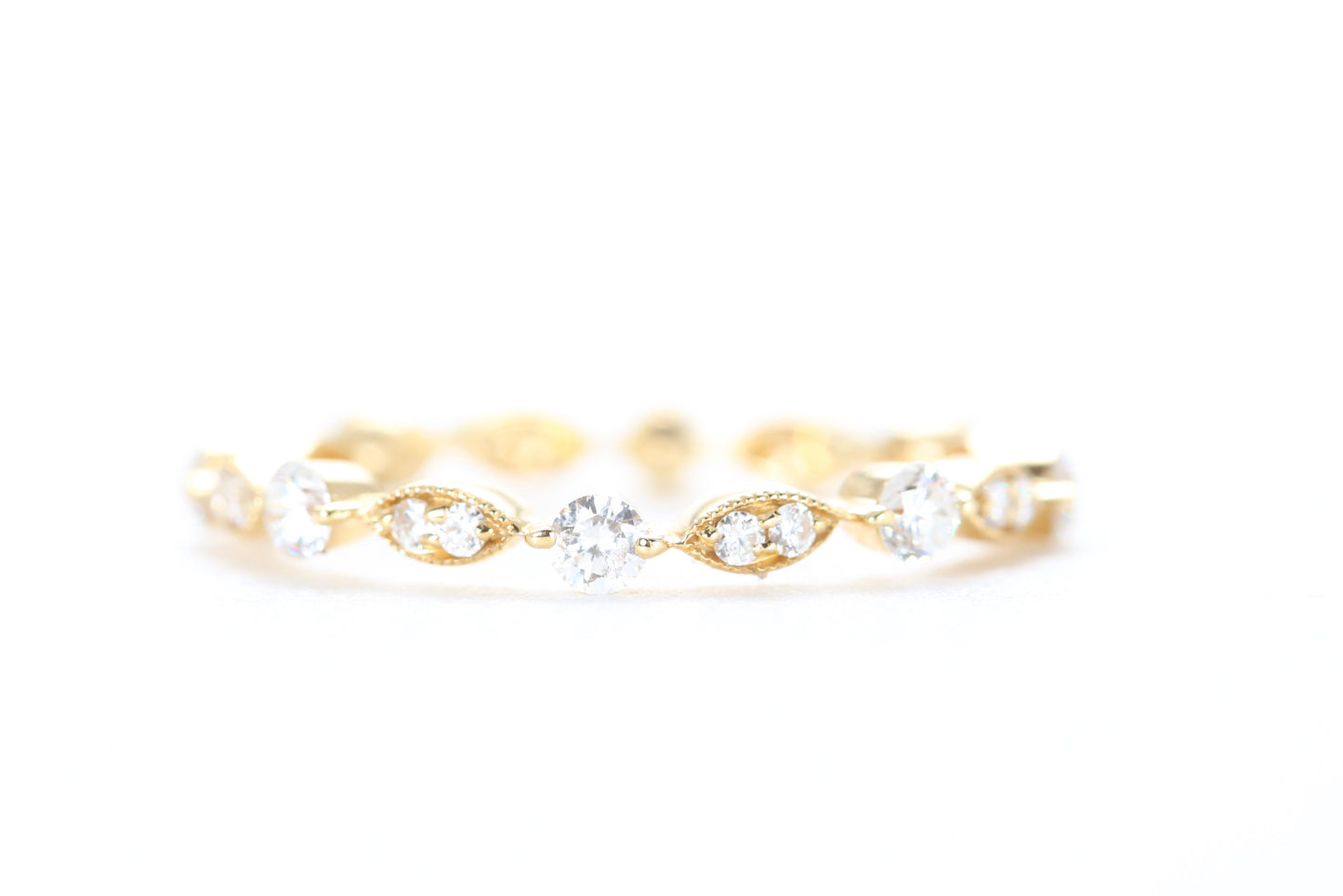 Round and Marquise Shaped Diamond Ring Yellow Gold