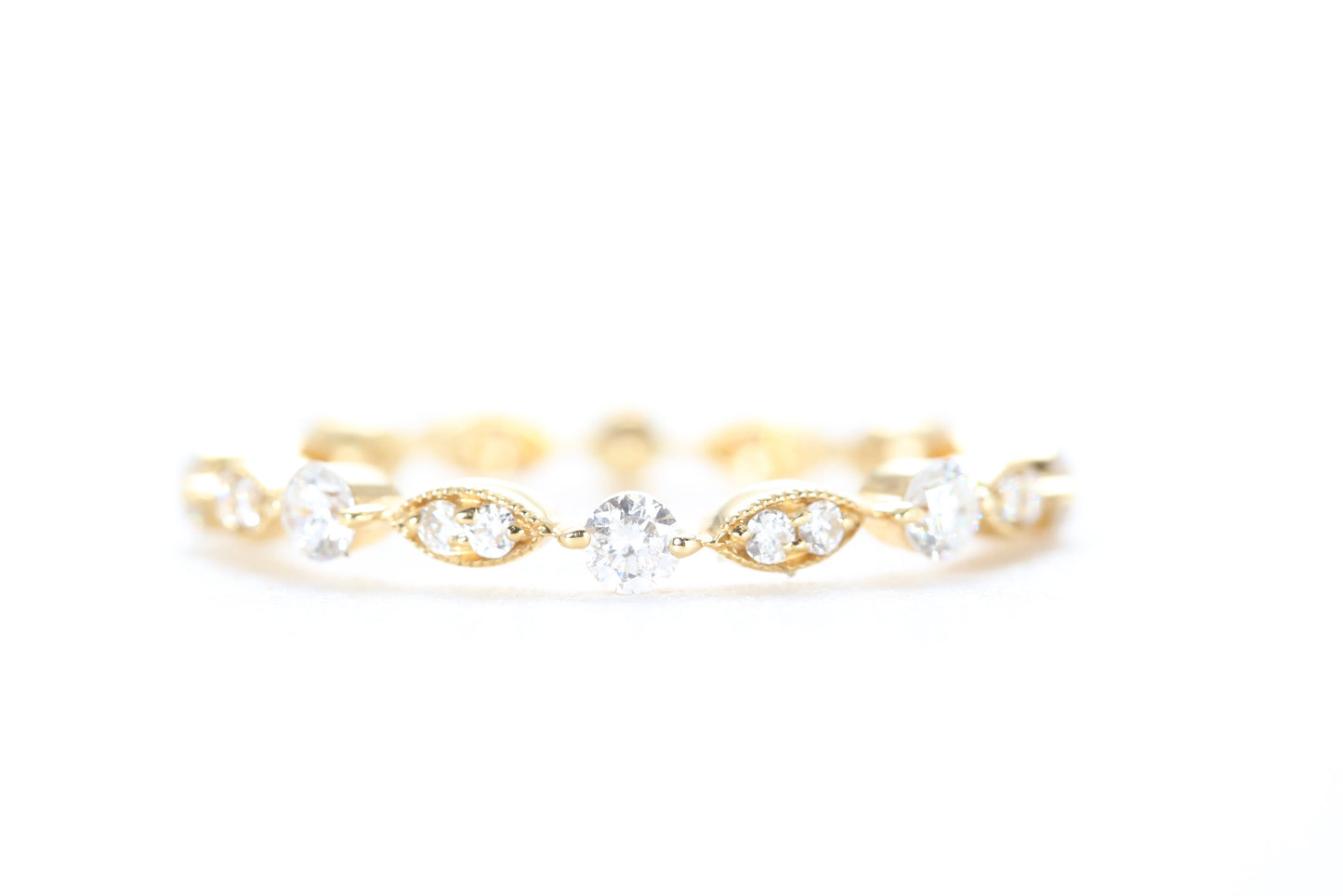 Round and Marquise Shaped Diamond Ring Yellow Gold