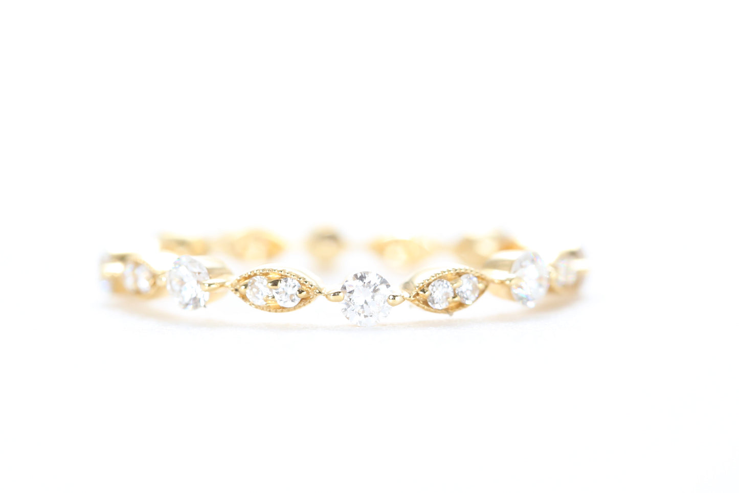 Round and Marquise Shaped Diamond Ring Yellow Gold