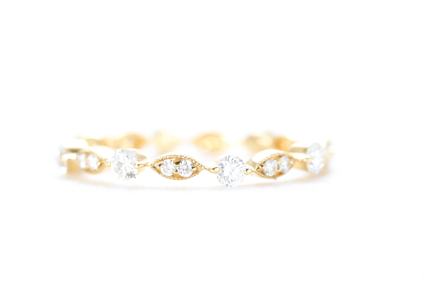 Round and Marquise Shaped Diamond Ring Yellow Gold