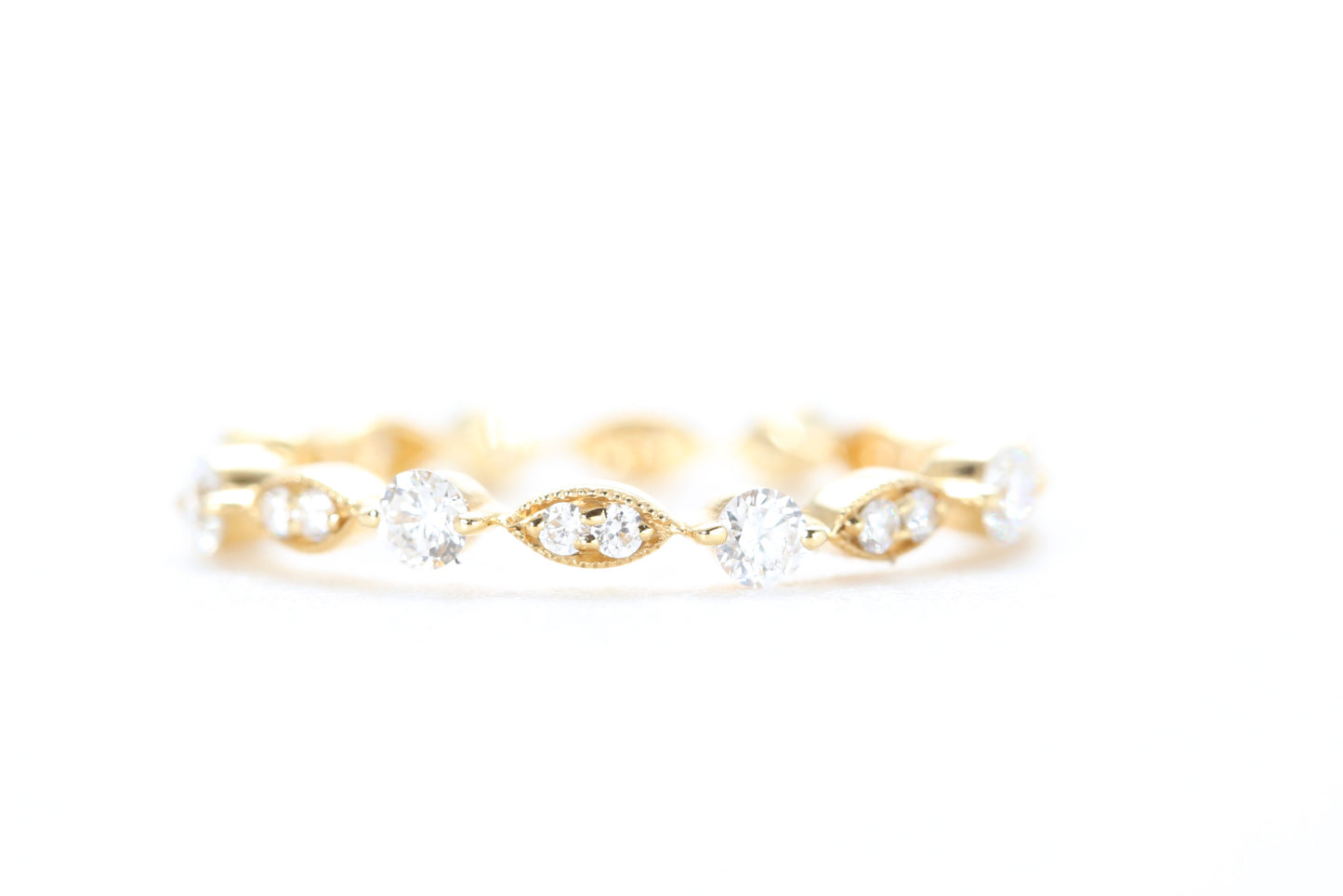 Round and Marquise Shaped Diamond Ring Yellow Gold
