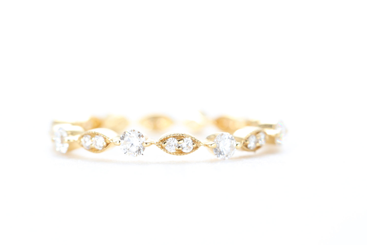 Round and Marquise Shaped Diamond Ring Yellow Gold