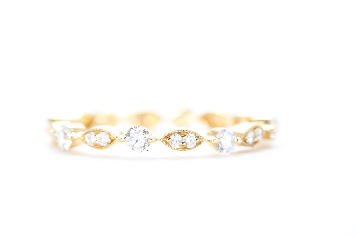 Round and Marquise Shaped Diamond Ring Yellow Gold