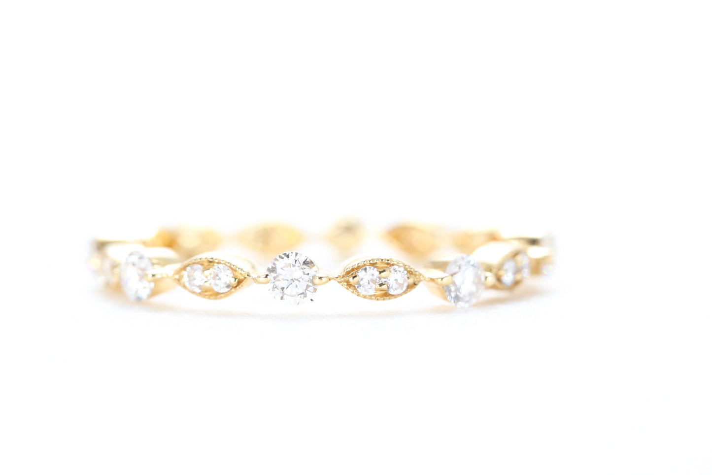Round and Marquise Shaped Diamond Ring Yellow Gold