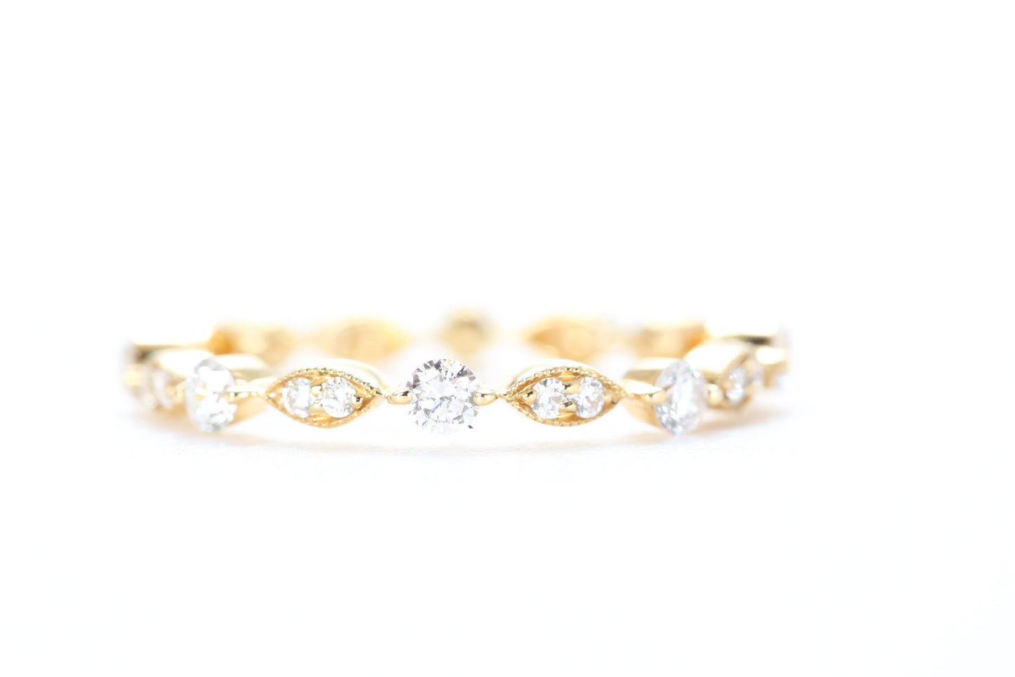 Round and Marquise Shaped Diamond Ring Yellow Gold