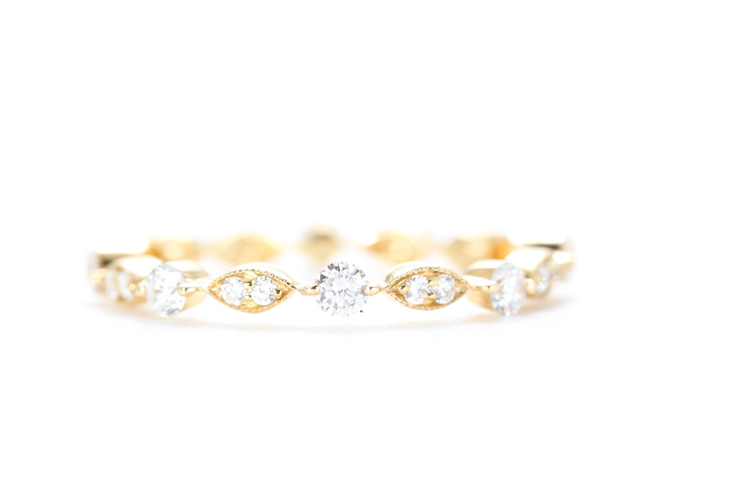 Round and Marquise Shaped Diamond Ring Yellow Gold