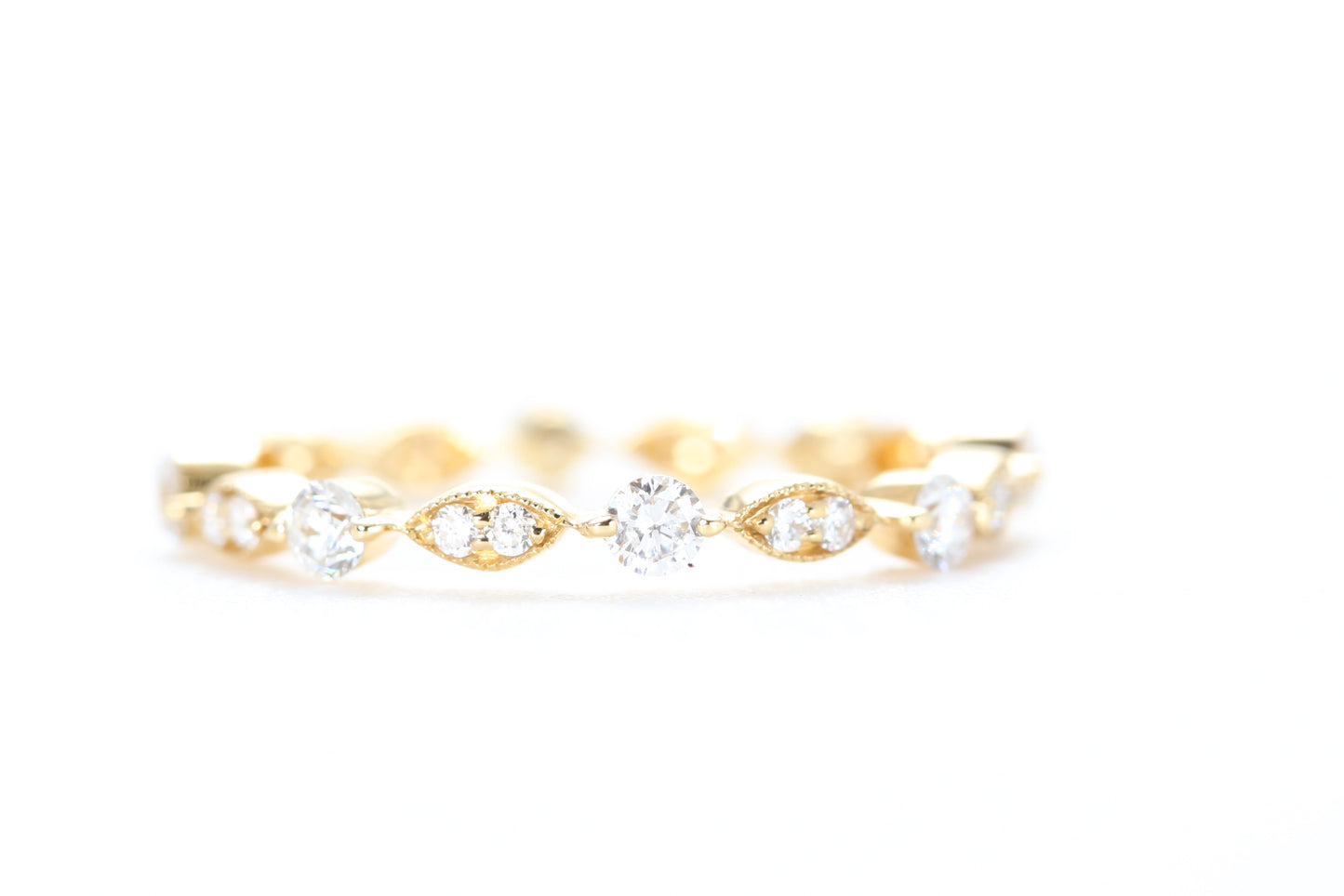 Round and Marquise Shaped Diamond Ring Yellow Gold