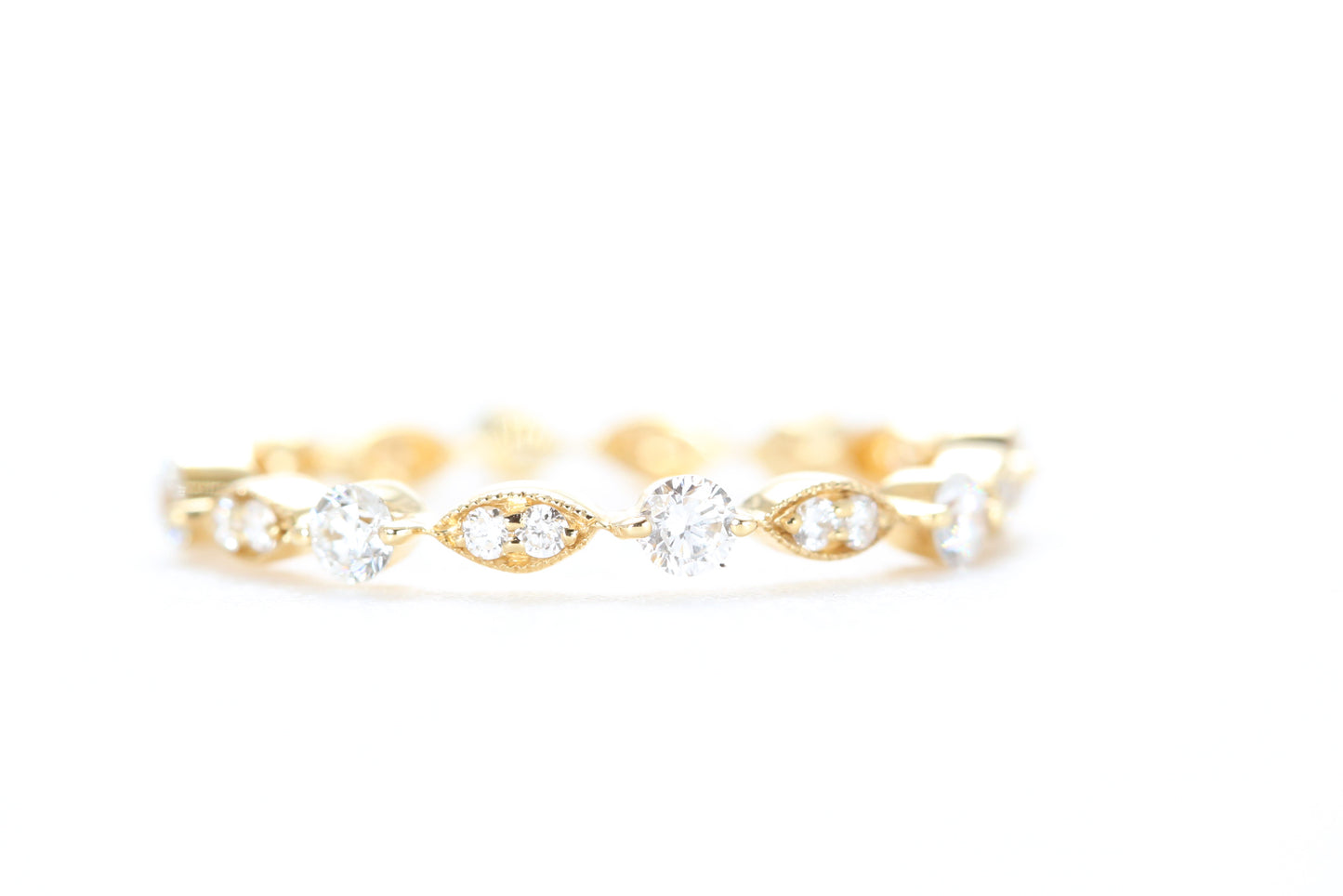 Round and Marquise Shaped Diamond Ring Yellow Gold