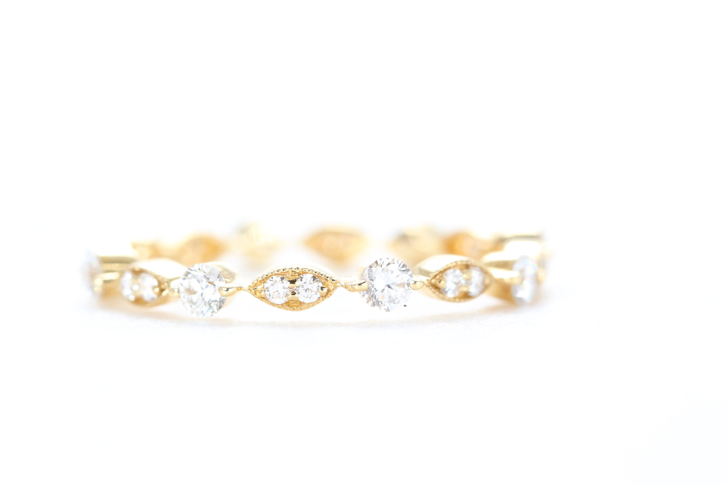 Round and Marquise Shaped Diamond Ring Yellow Gold