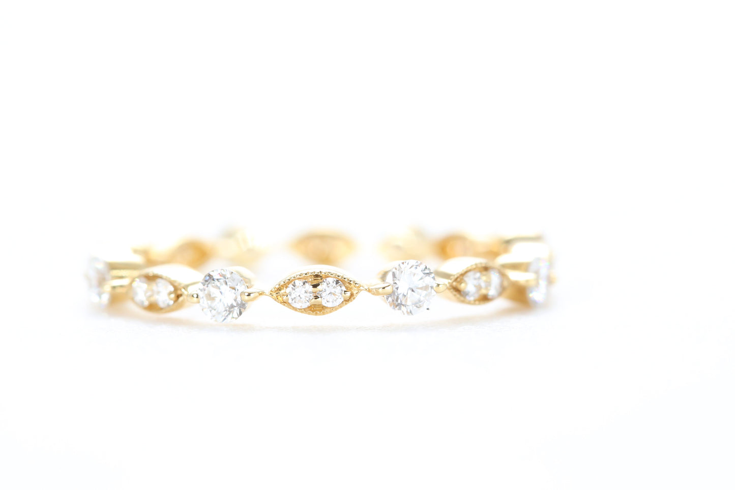 Round and Marquise Shaped Diamond Ring Yellow Gold