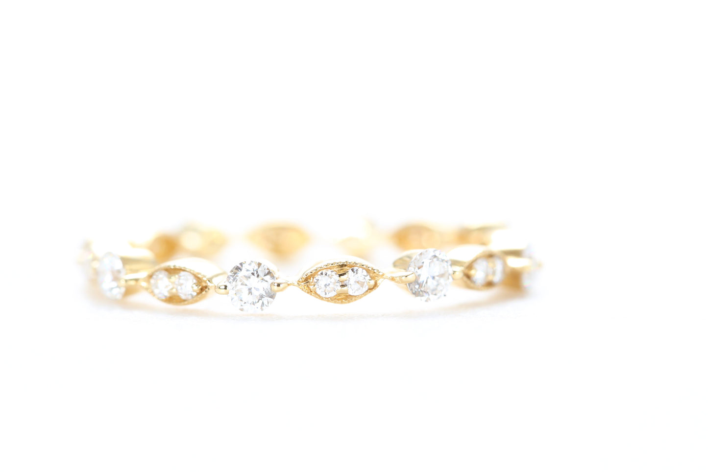 Round and Marquise Shaped Diamond Ring Yellow Gold