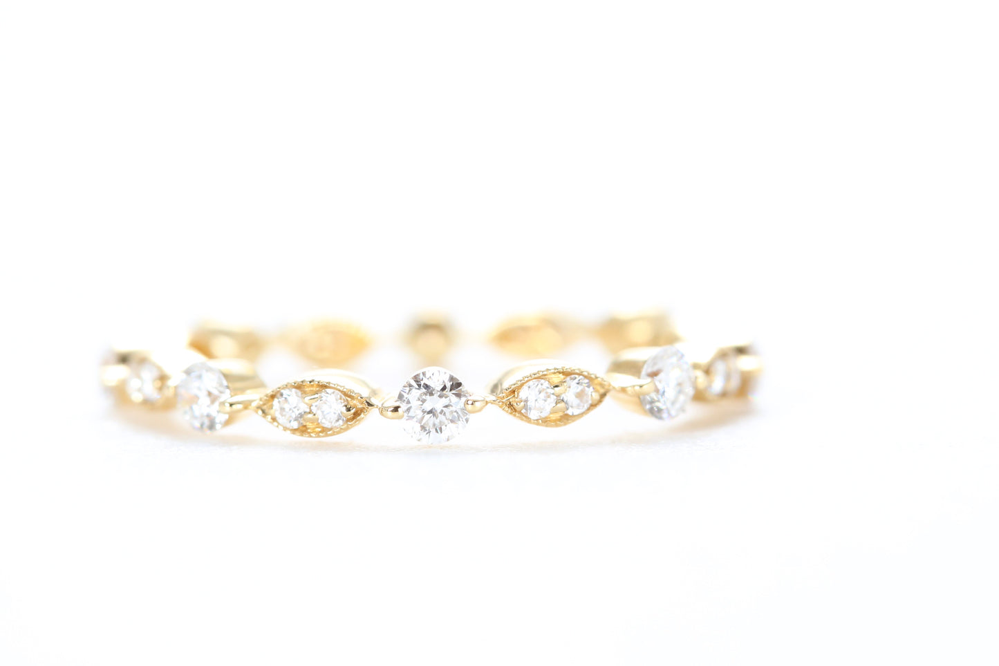 Round and Marquise Shaped Diamond Ring Yellow Gold