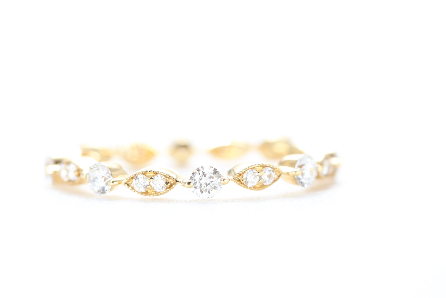 Round and Marquise Shaped Diamond Ring Yellow Gold