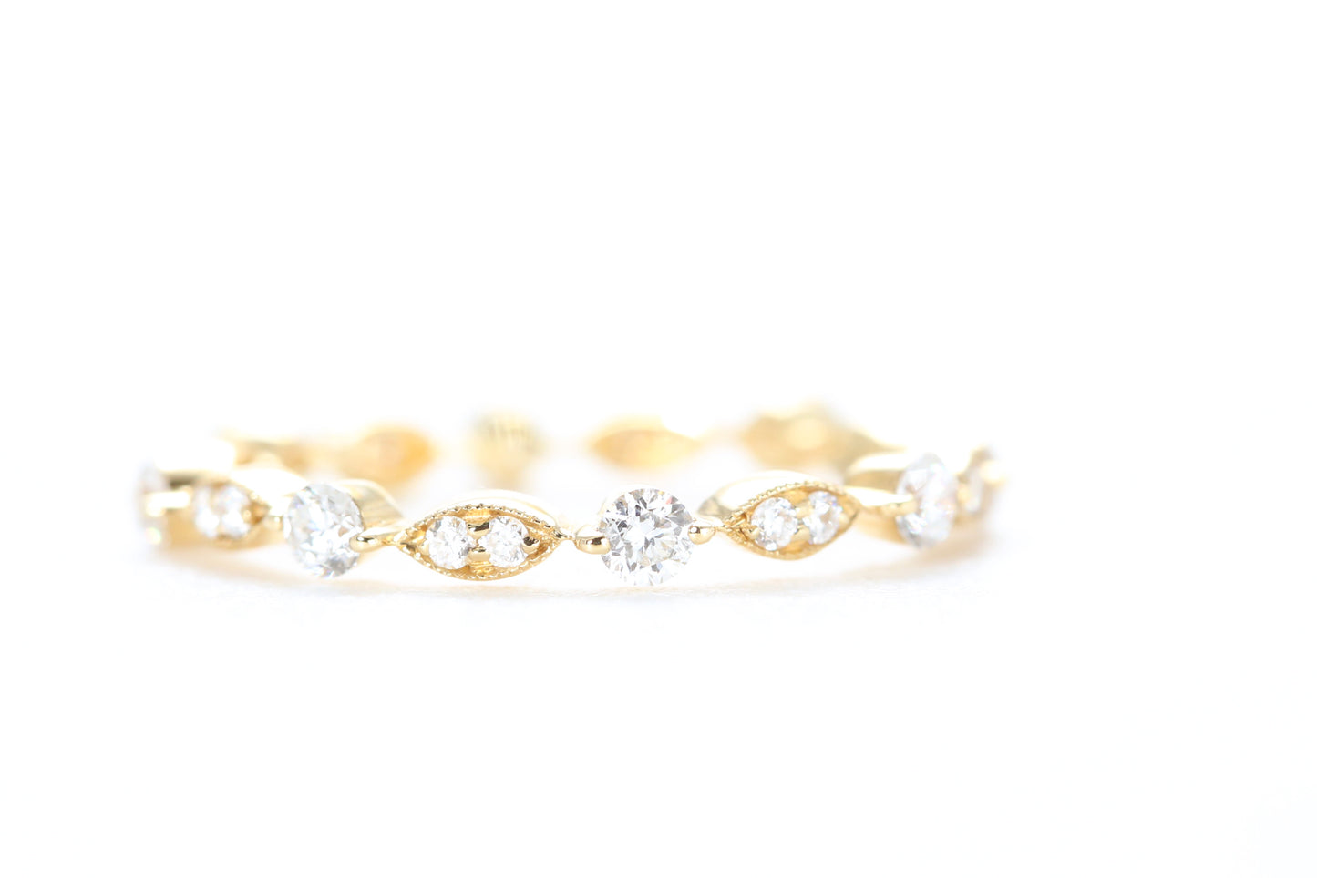 Round and Marquise Shaped Diamond Ring Yellow Gold