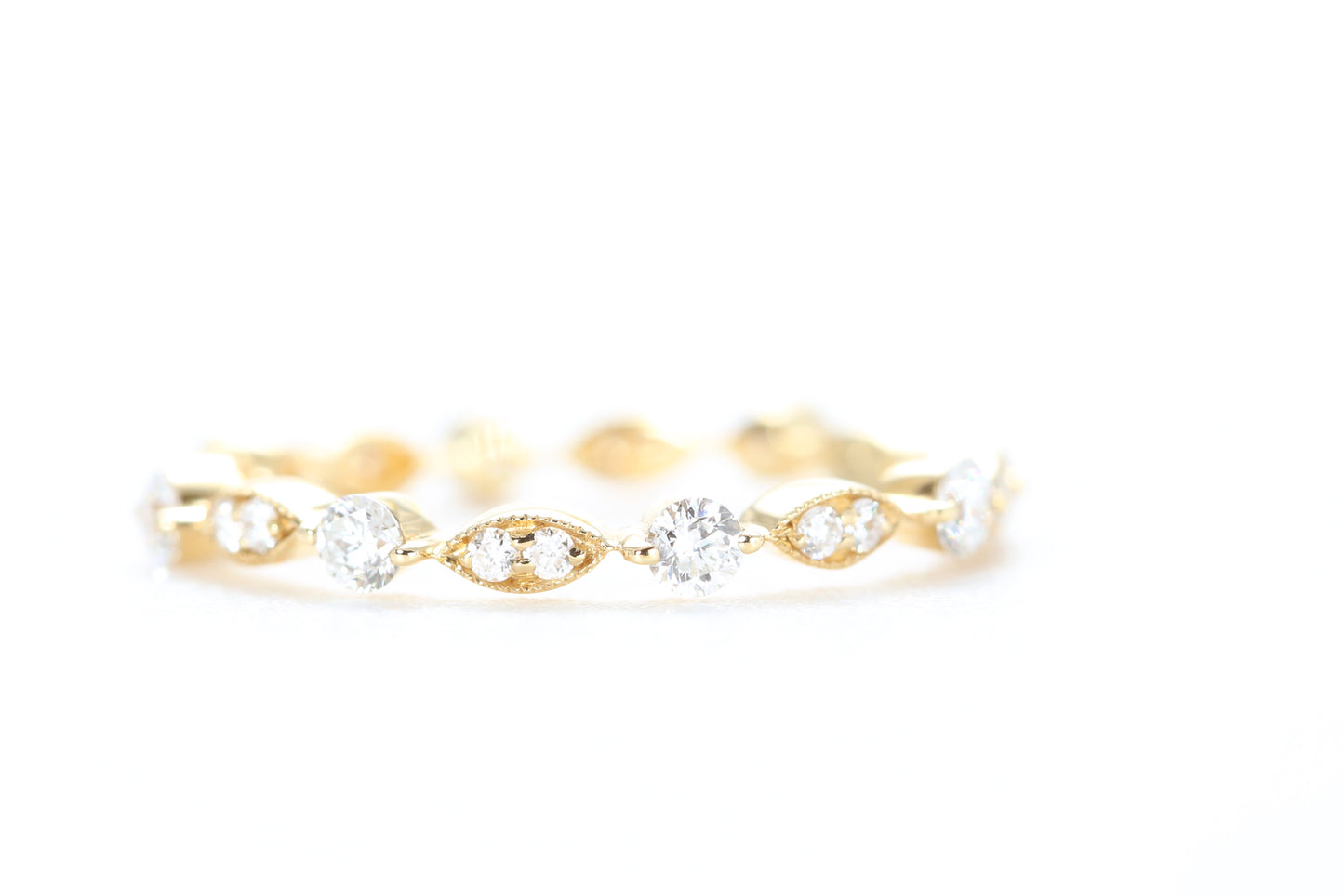 Round and Marquise Shaped Diamond Ring Yellow Gold