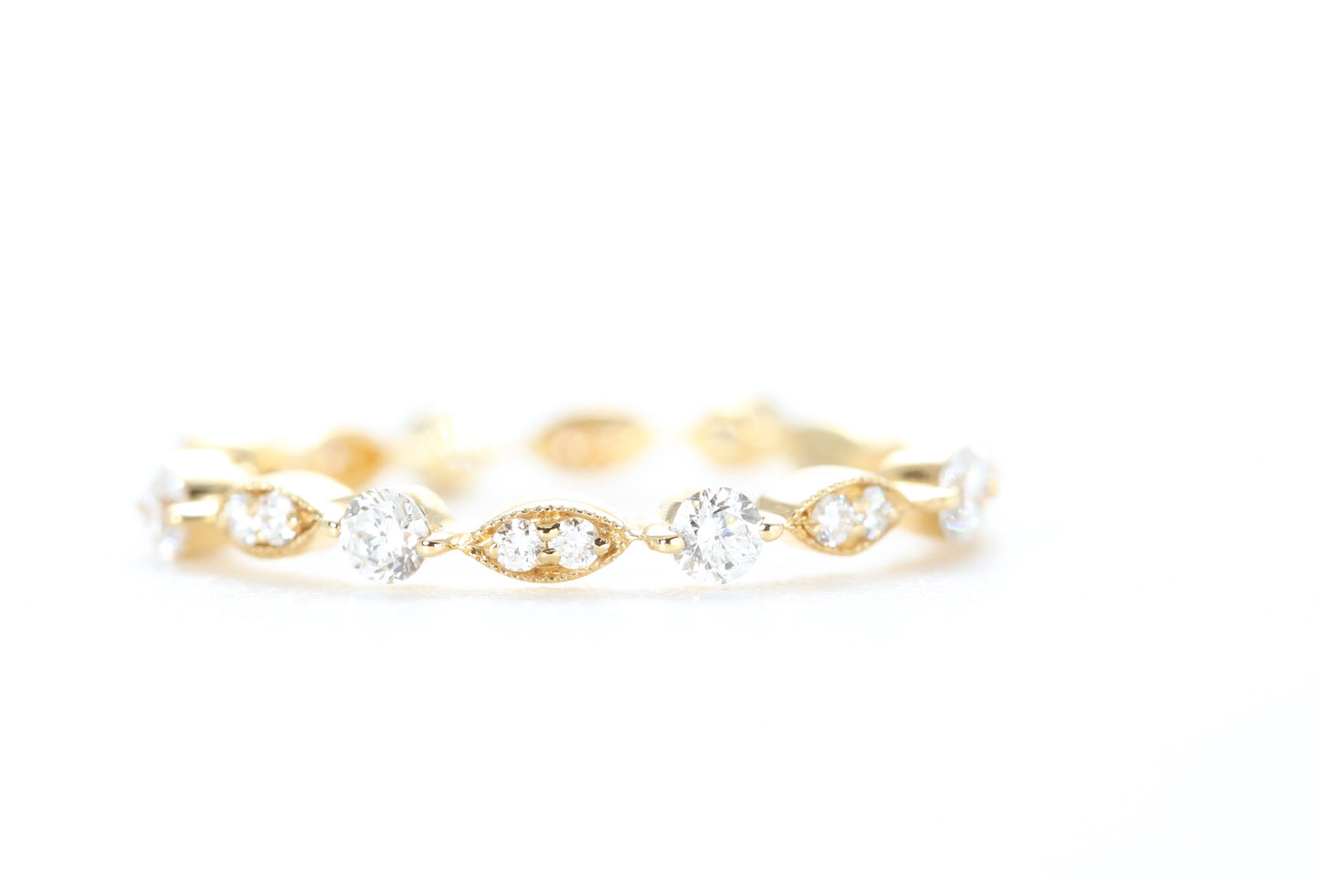 Round and Marquise Shaped Diamond Ring Yellow Gold