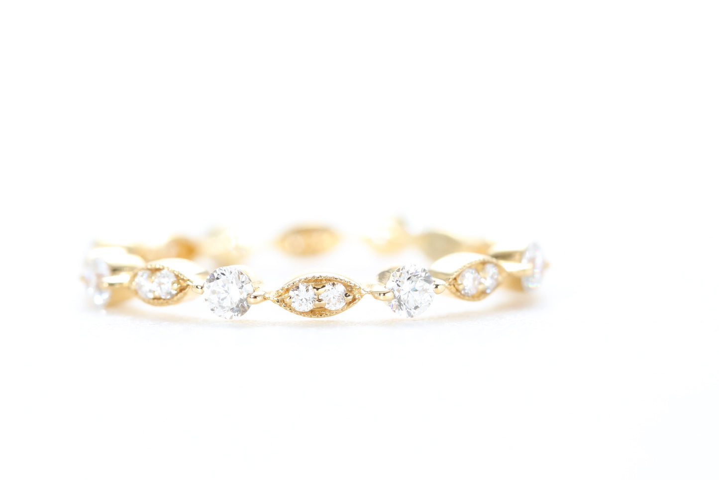 Round and Marquise Shaped Diamond Ring Yellow Gold