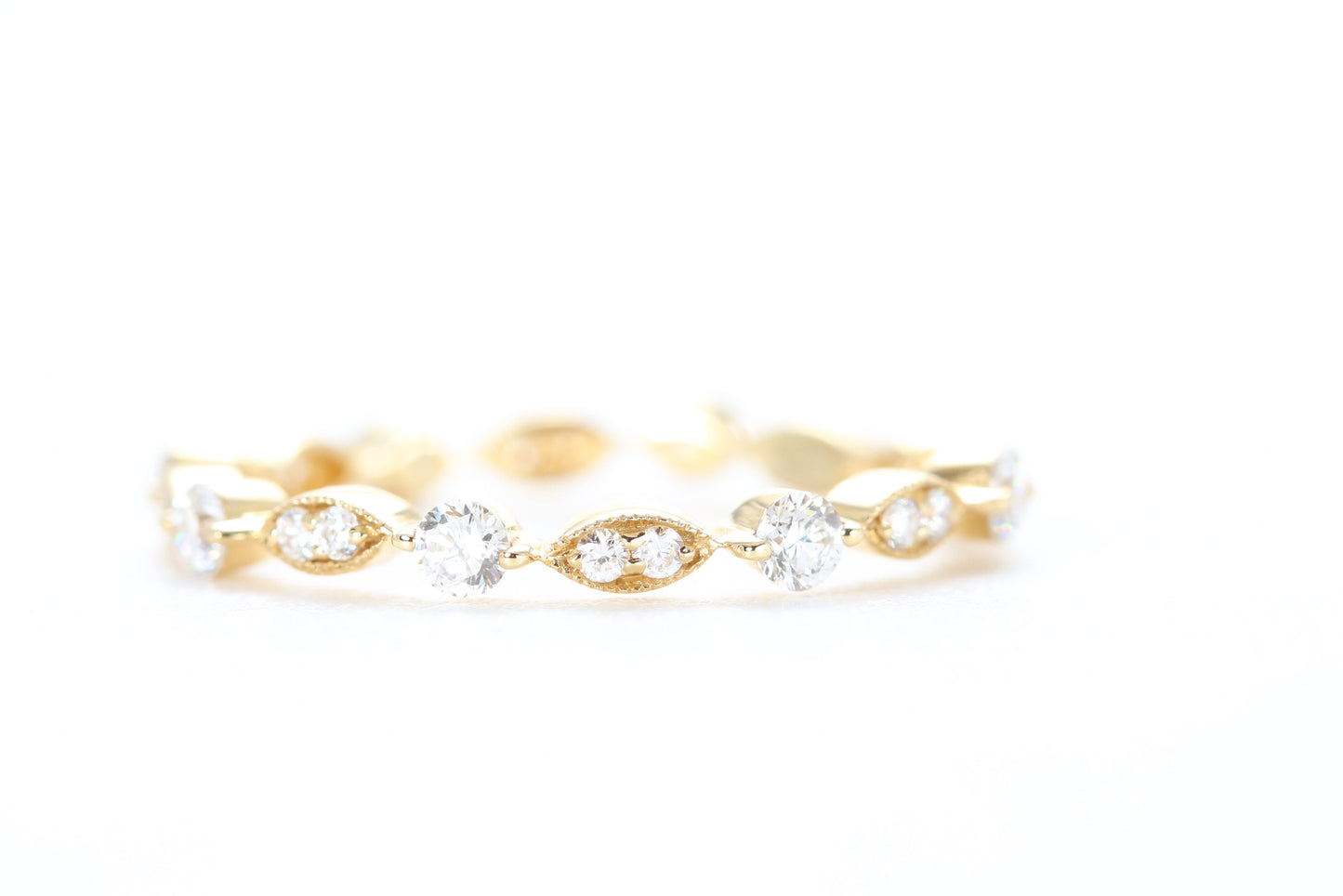 Round and Marquise Shaped Diamond Ring Yellow Gold