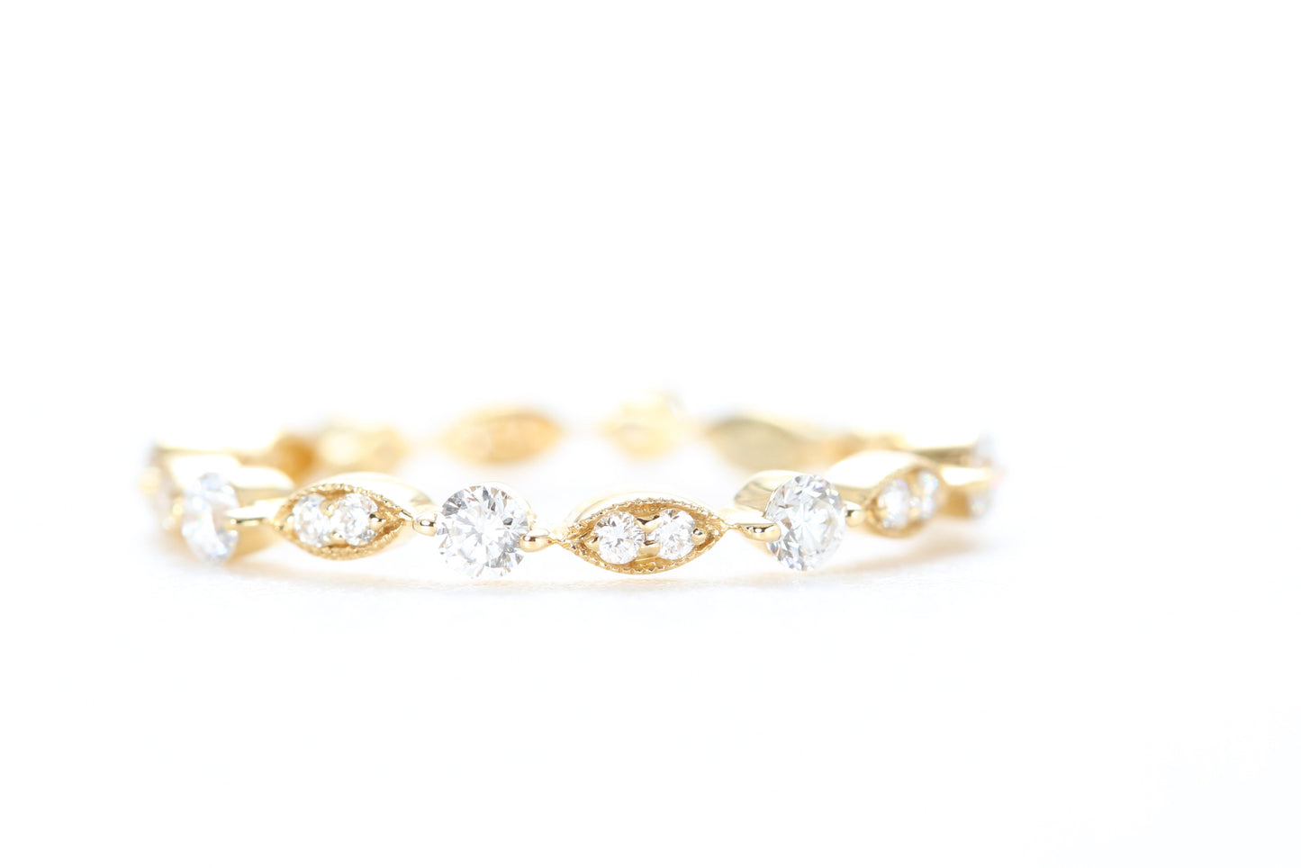 Round and Marquise Shaped Diamond Ring Yellow Gold