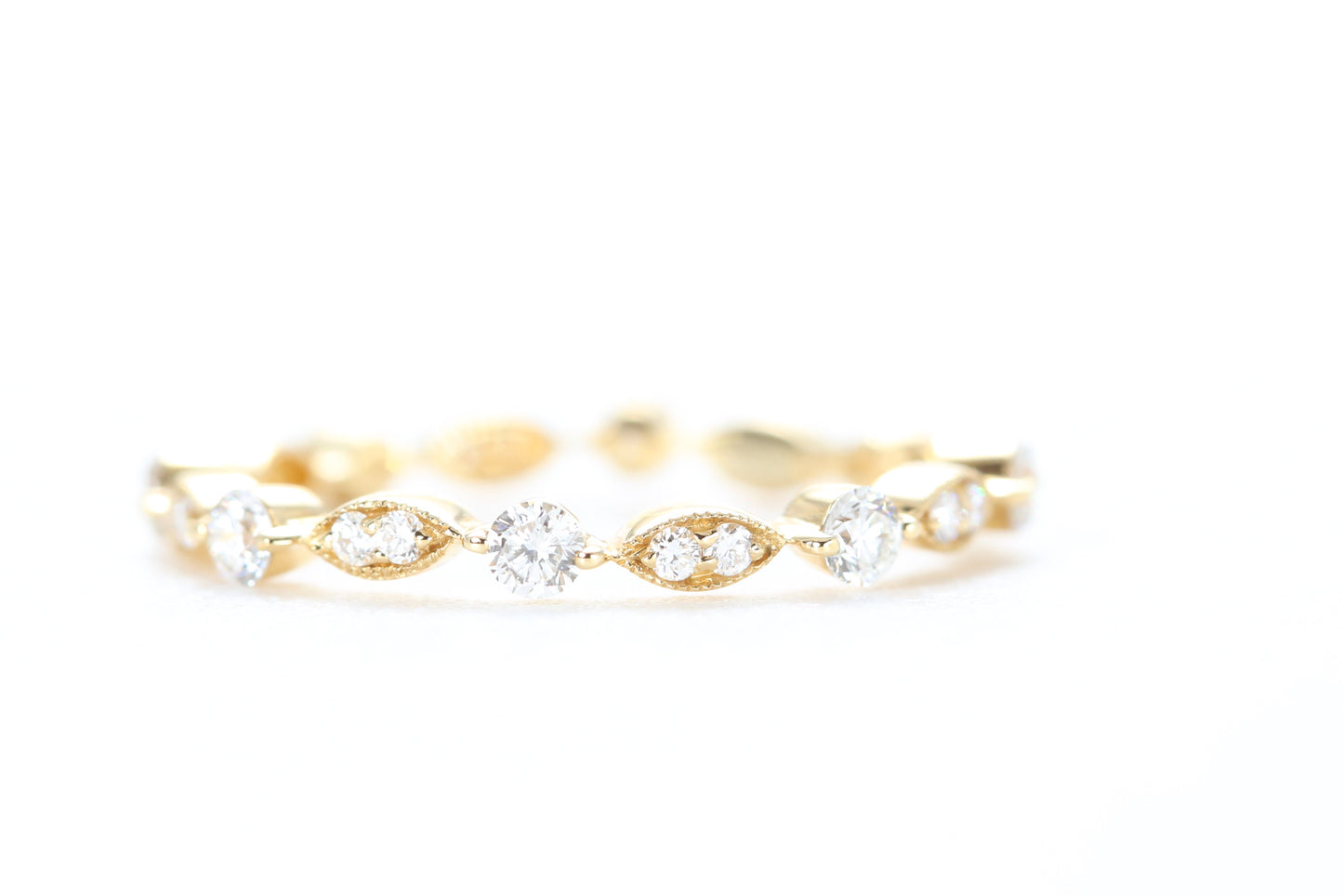 Round and Marquise Shaped Diamond Ring Yellow Gold