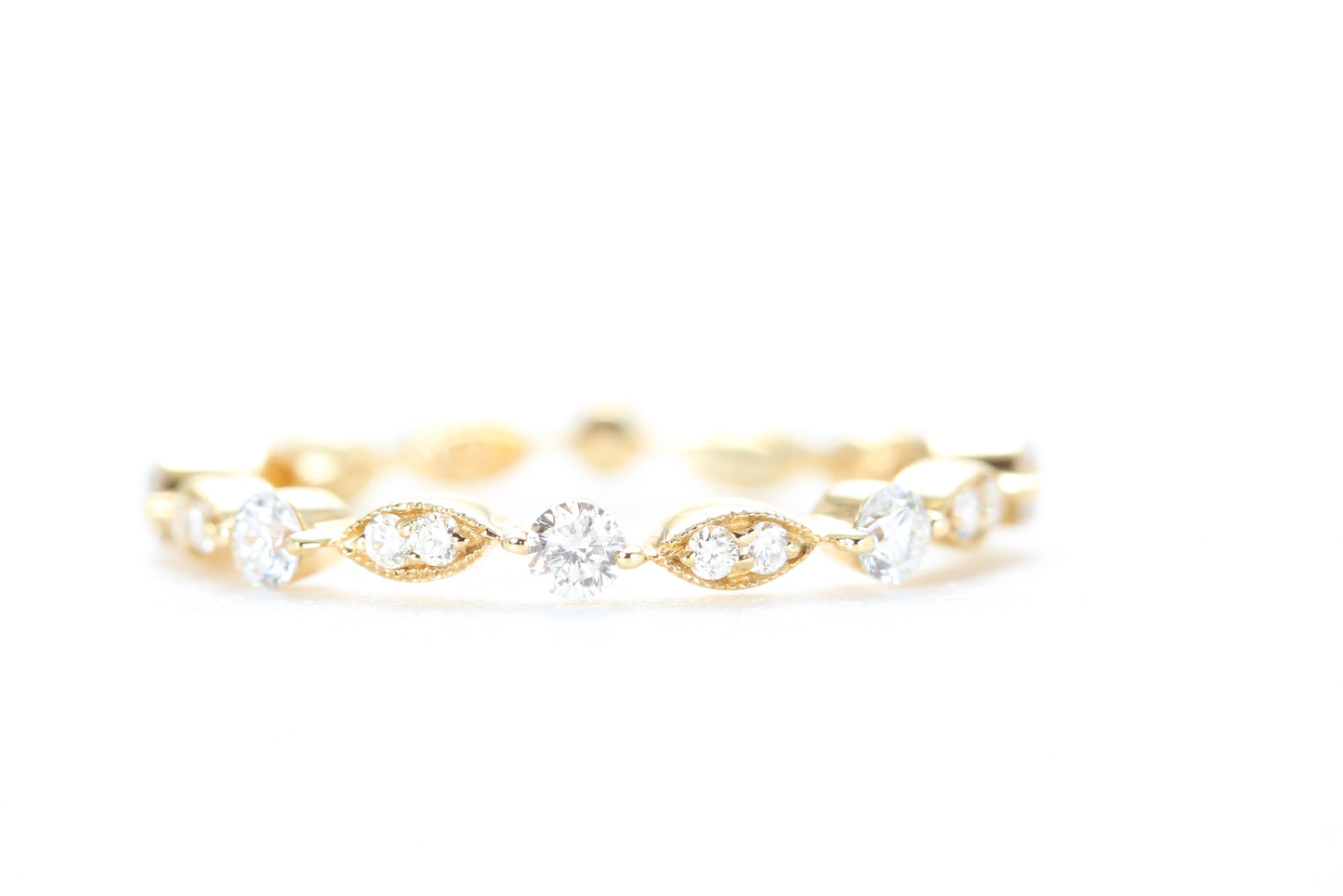 Round and Marquise Shaped Diamond Ring Yellow Gold