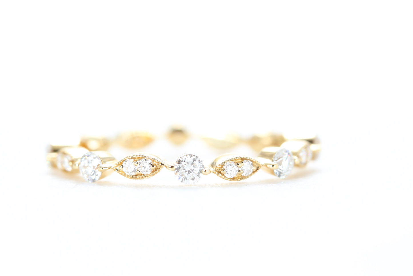 Round and Marquise Shaped Diamond Ring Yellow Gold