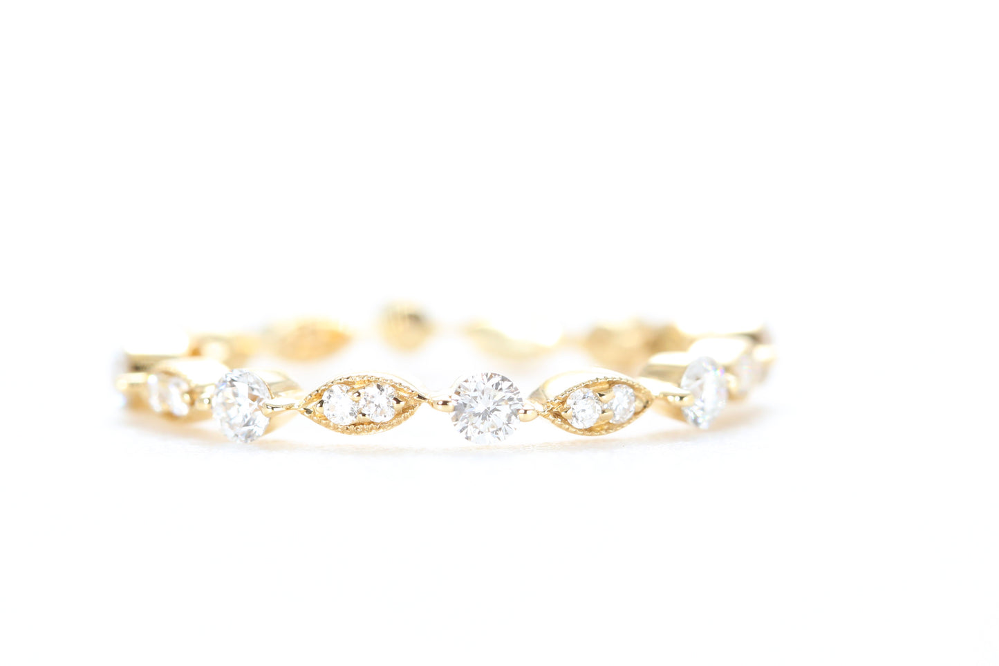 Round and Marquise Shaped Diamond Ring Yellow Gold