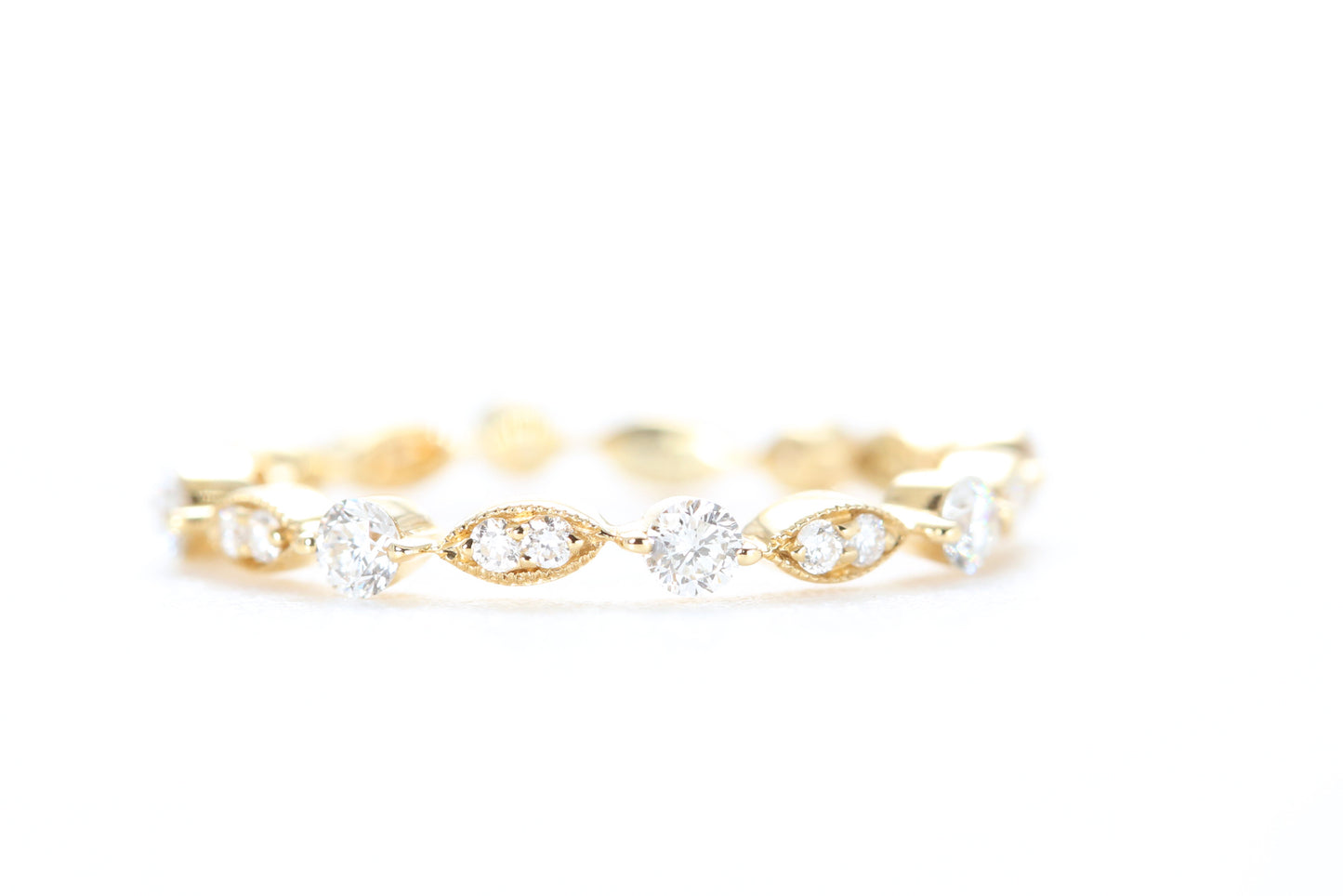 Round and Marquise Shaped Diamond Ring Yellow Gold
