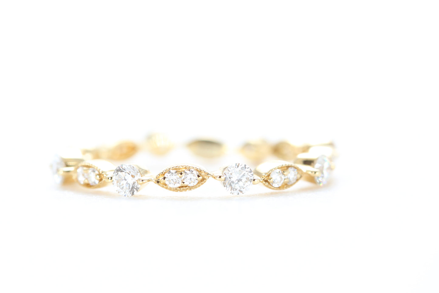 Round and Marquise Shaped Diamond Ring Yellow Gold