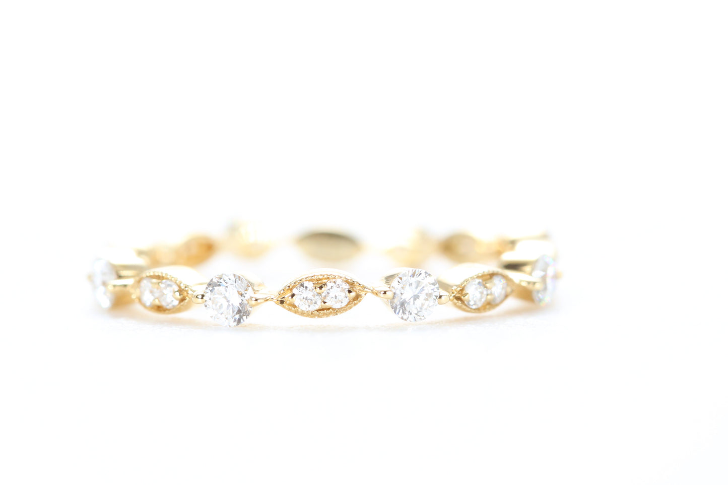 Round and Marquise Shaped Diamond Ring Yellow Gold