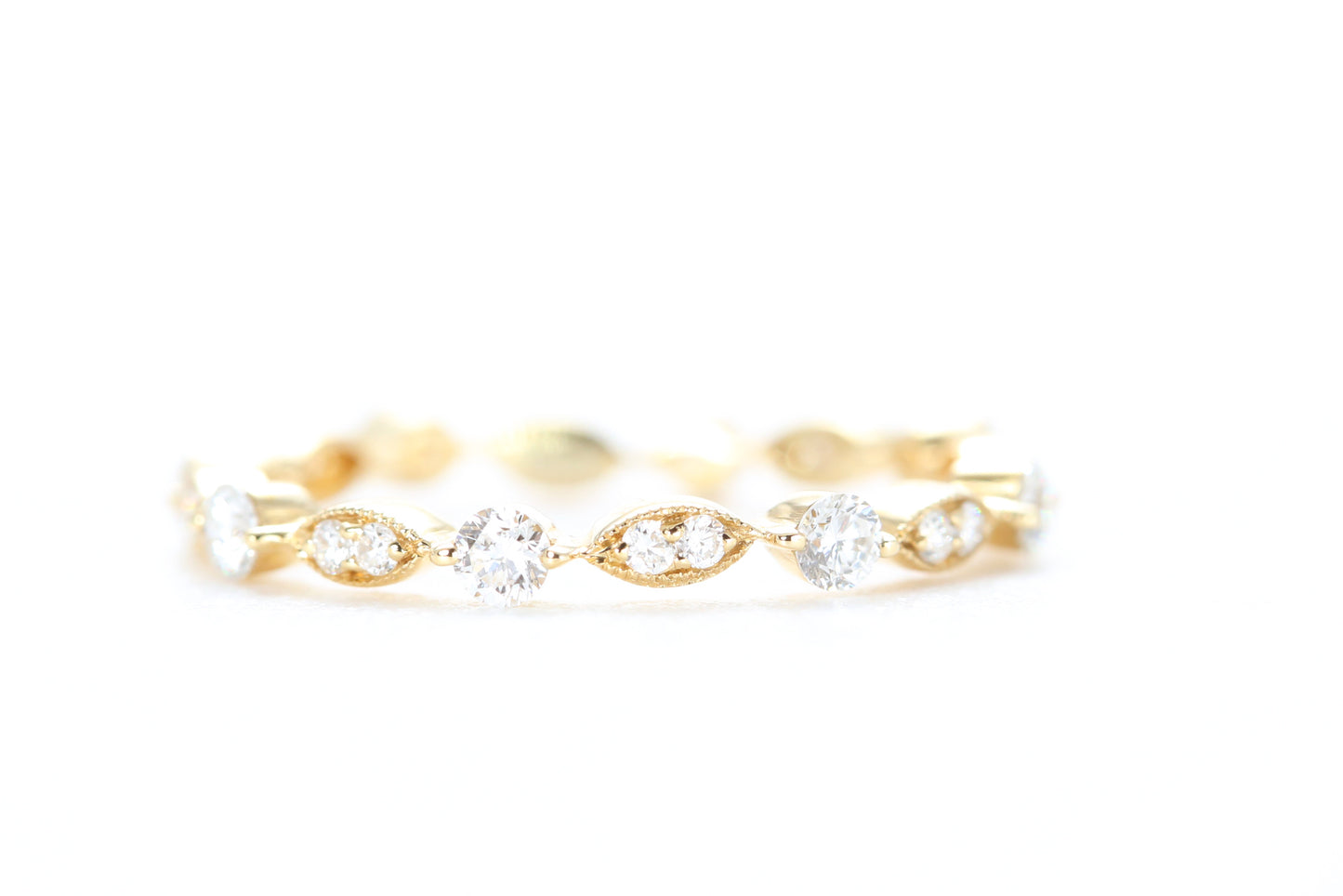 Round and Marquise Shaped Diamond Ring Yellow Gold