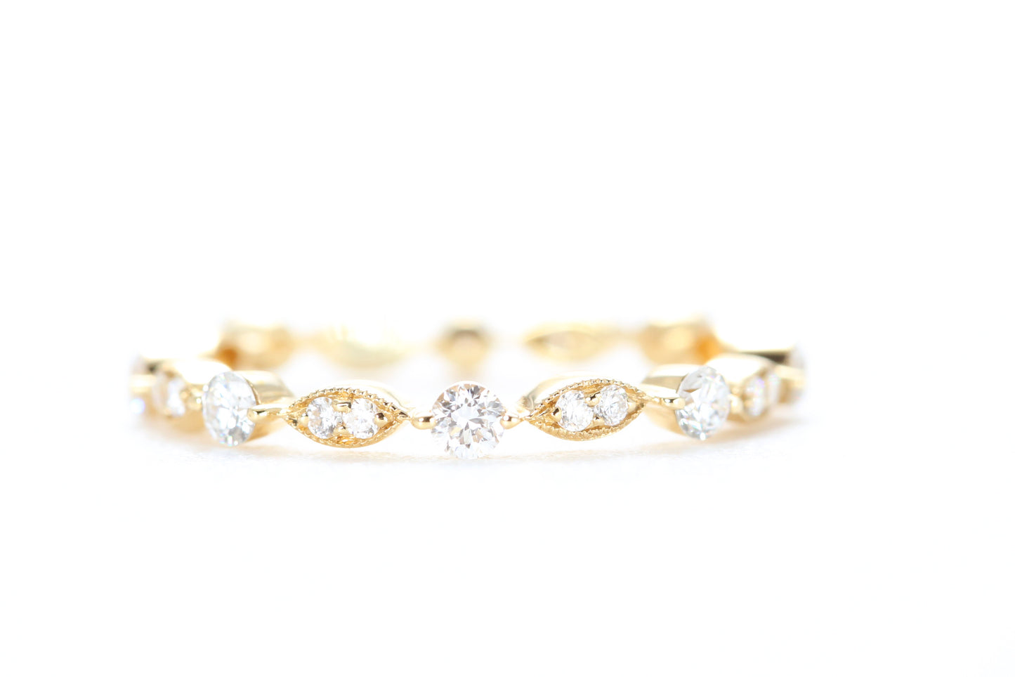 Round and Marquise Shaped Diamond Ring Yellow Gold