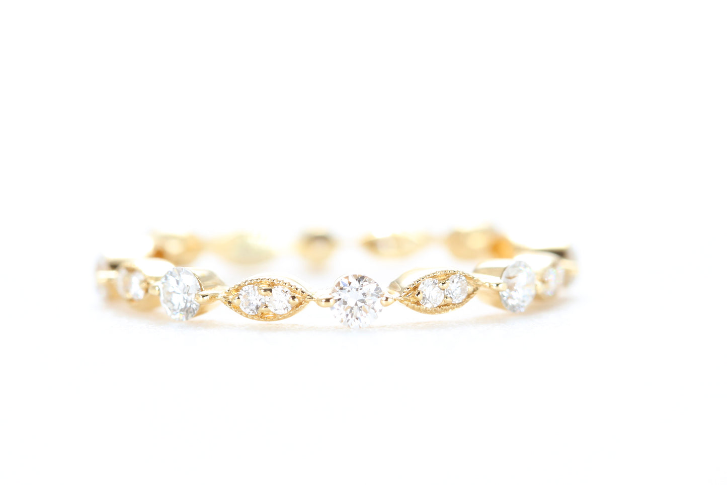 Round and Marquise Shaped Diamond Ring Yellow Gold